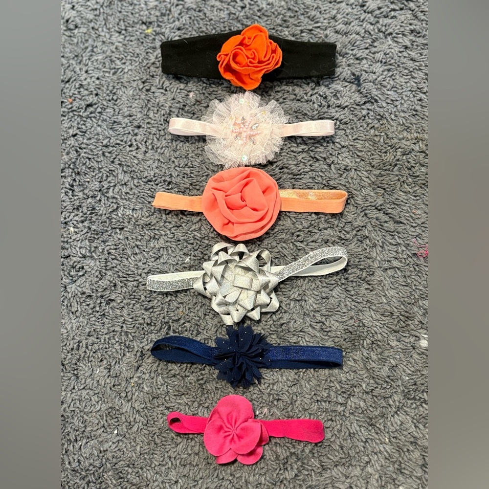 Lightly worn set of 6 baby decorative headbands